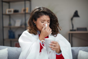 femme qui a du rhume
